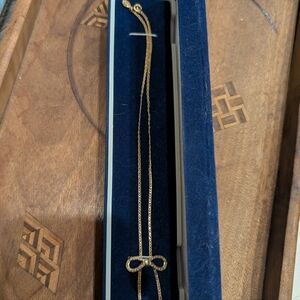 Elegant Gold Bow Necklace By Avon